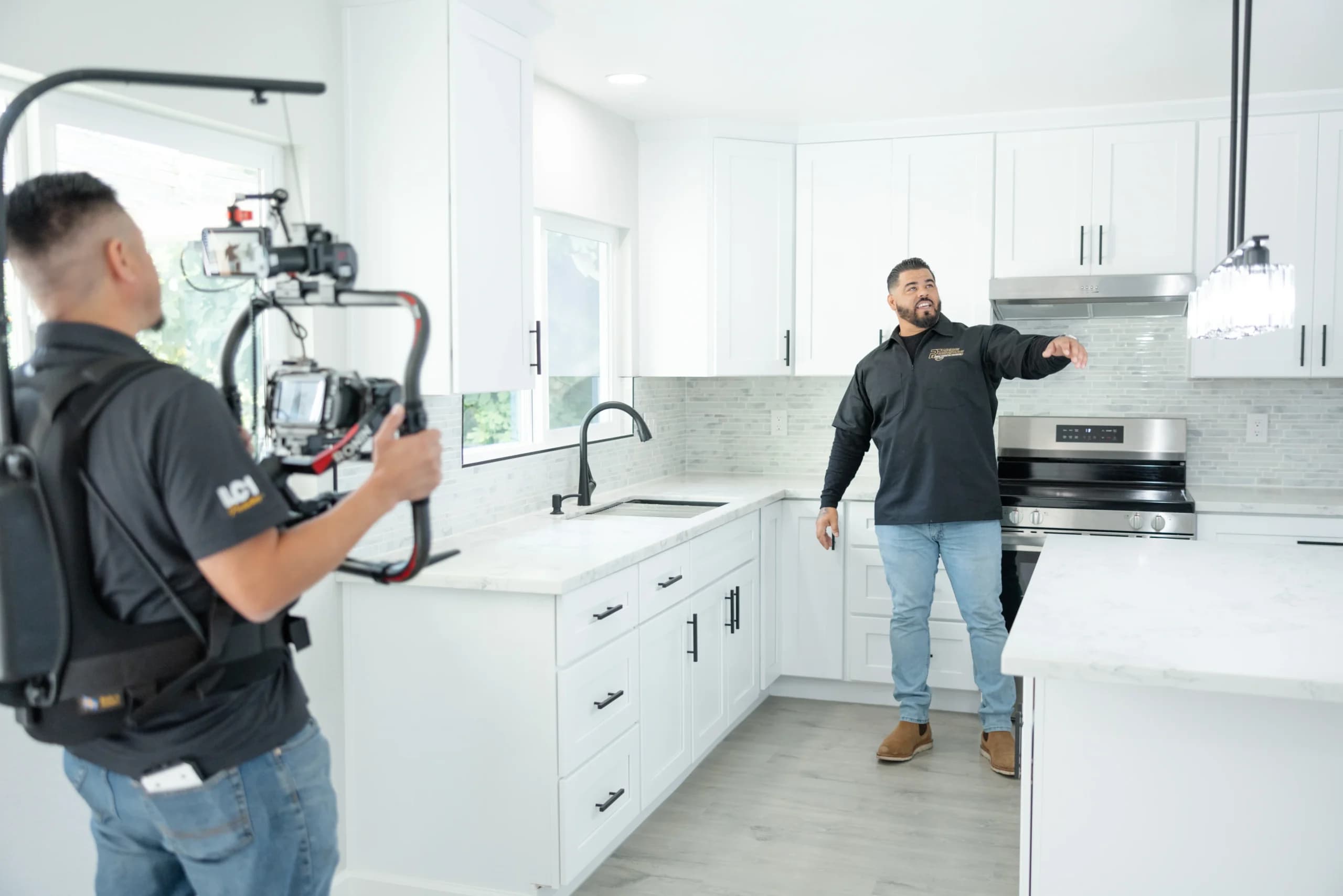An LC1 Productions camera operator filming a walkthrough on location